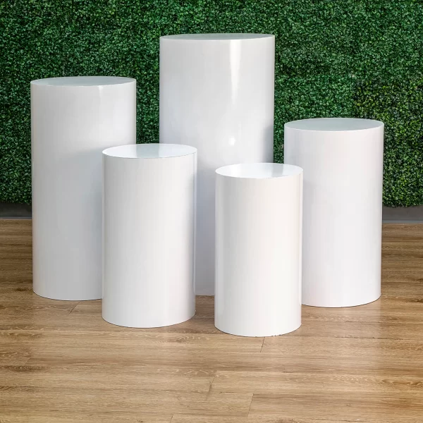 white cylinder stands